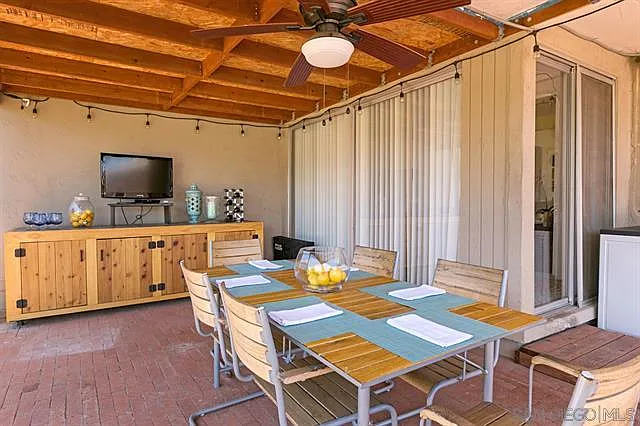 Back patio. Smaller sliding door is now a wall and has the Barista Area on the inside. Larger Sliding door is now a regular sized sliding door.