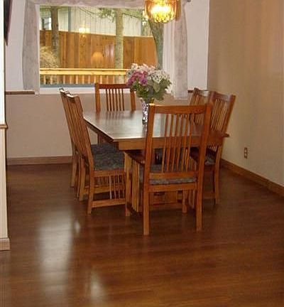 The dining room is off of the front room, again with lots of light.