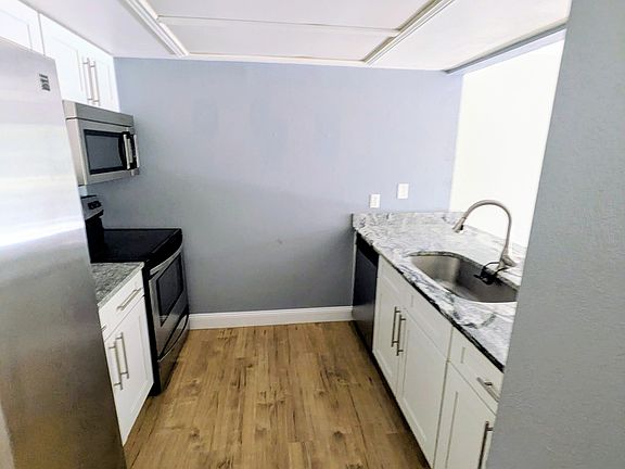 3rd image of 4896 S Dudley St #55