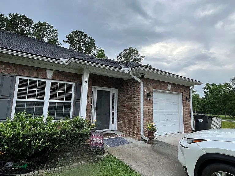 Duplex, one level condo, one car garage with ample parking.