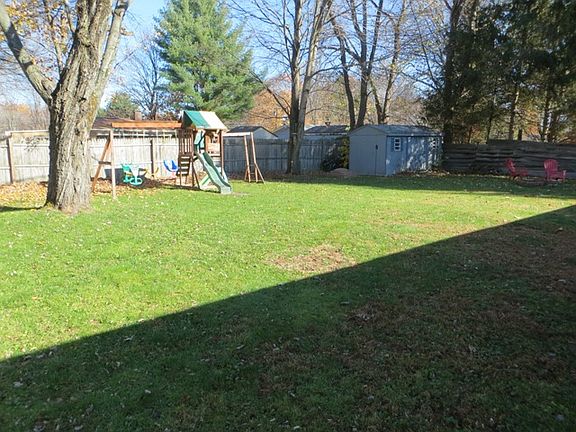 Flat back yard with Fire Pit