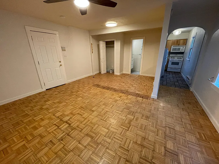 main room, closet, looking to kitchen