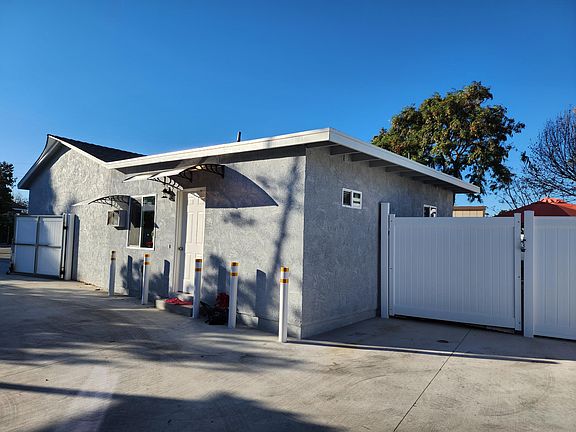 Front View of Duplex & side backyard fully Fenced