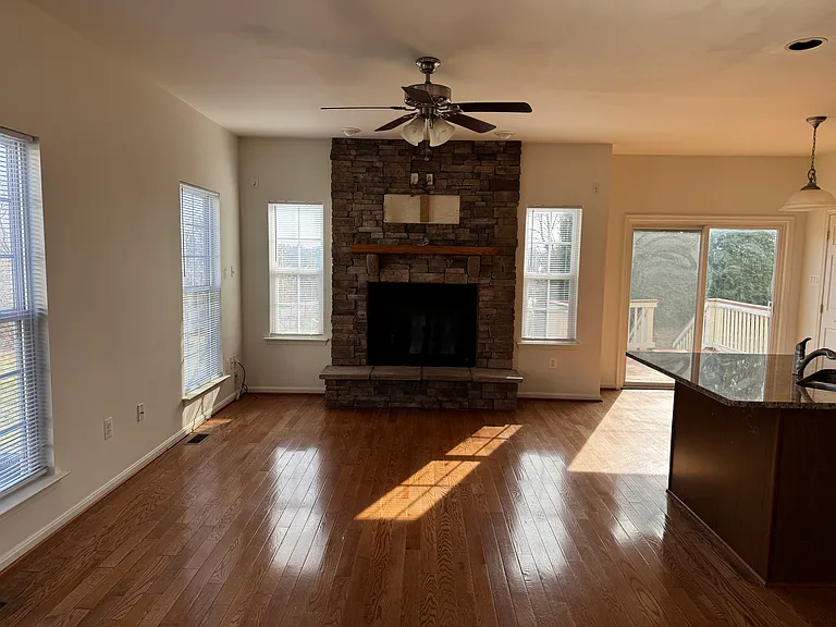 Family Area with Stone Fireplace.