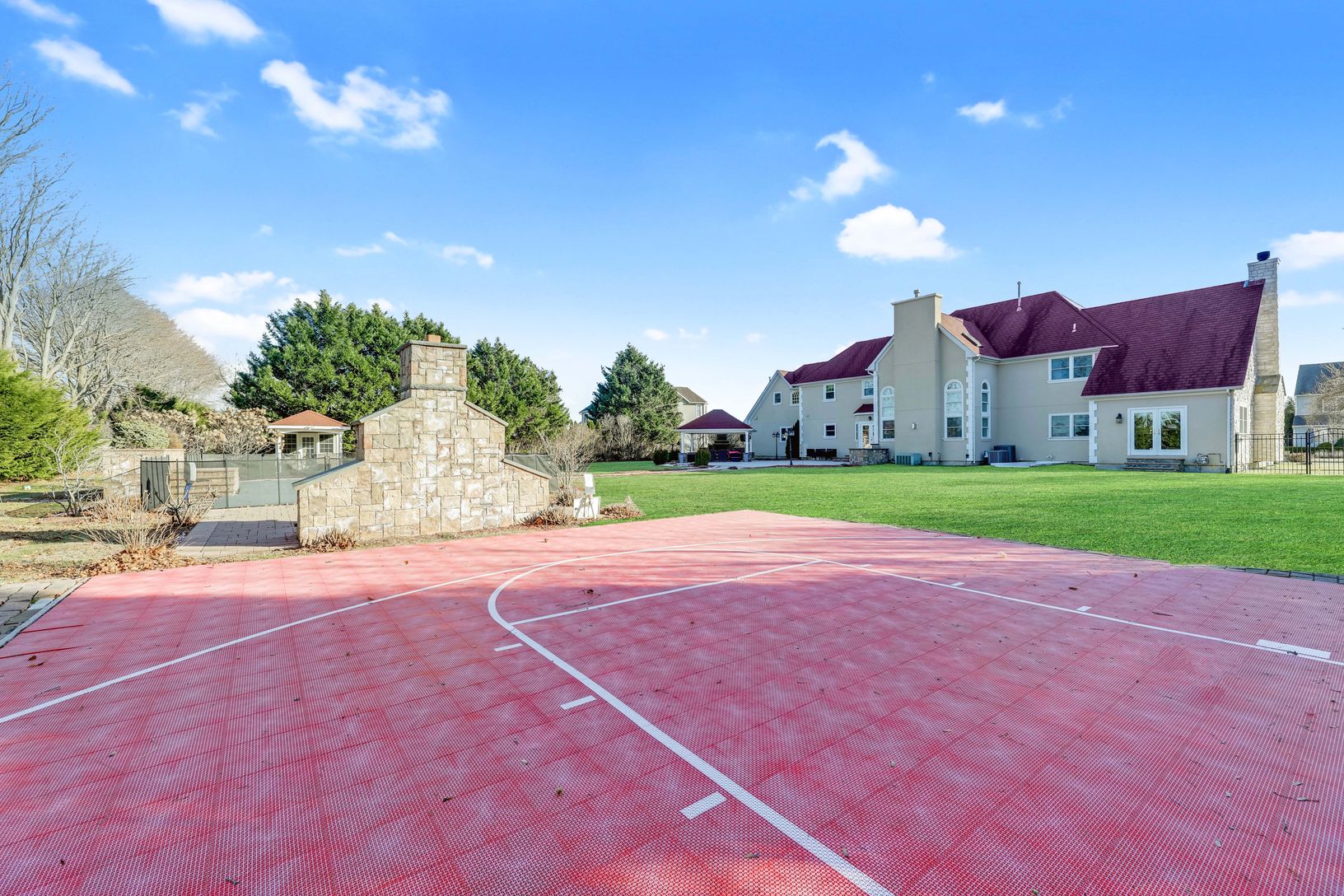  Basketball Court & Custom Fireplace with Seating Area
