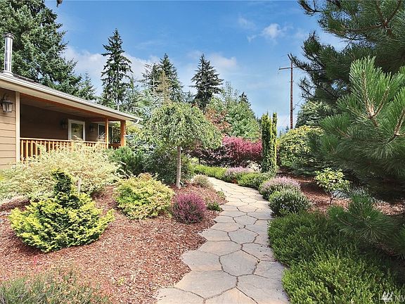 Stone walk-way to covered porch.