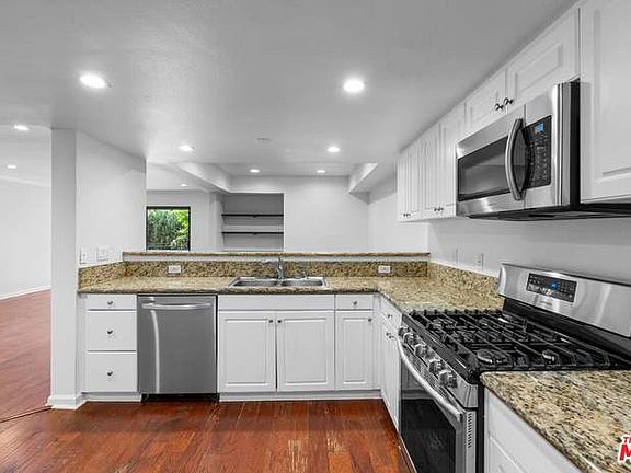 4th image of 5009 Woodman Ave #A310