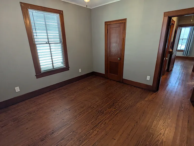 Bedroom 2 looking towards hallway. Closed door is closet