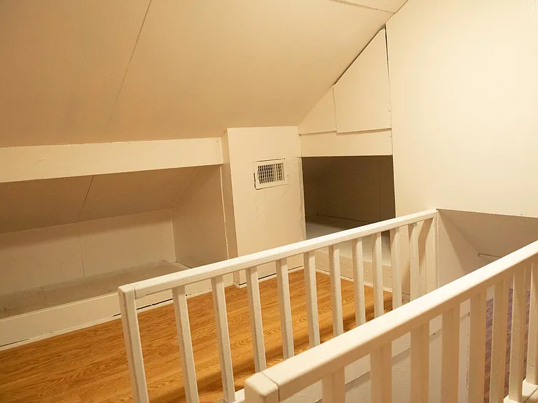 Top of stairs - attic Room 1