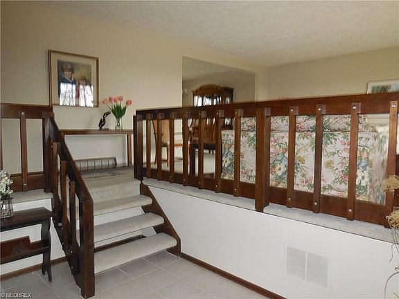 Formal Living Room off Foyer with wall to wall carpeting.