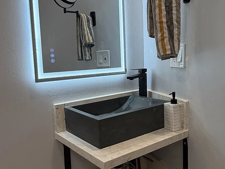 Smart mirror and vessel sink bathroom vanity