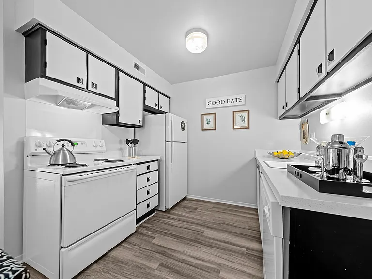 A modern kitchen at Westwood Village Apartments in Westland
