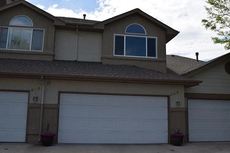 Two car attached garage with opener, adjacent to Coal Creak trail