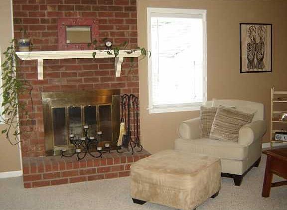 Floor to ceiling fireplace, new 2" blinds, neutral berber carpet