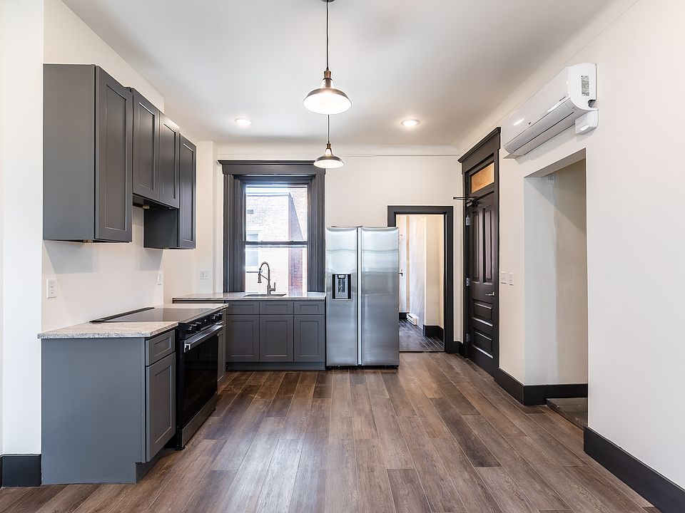 Nice kitchen includes all new appliances and laundry will soon get a barndoor. Microwave and handles will be added soon.