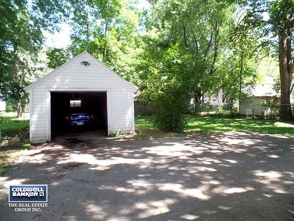GARAGE W/EXTRA PARKING AREA