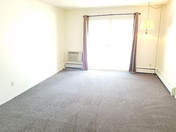 view of living room and door out to patio