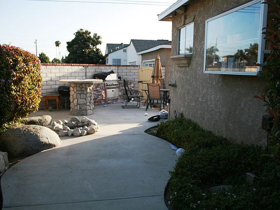 Side Yard w/Built In BBQ & Table