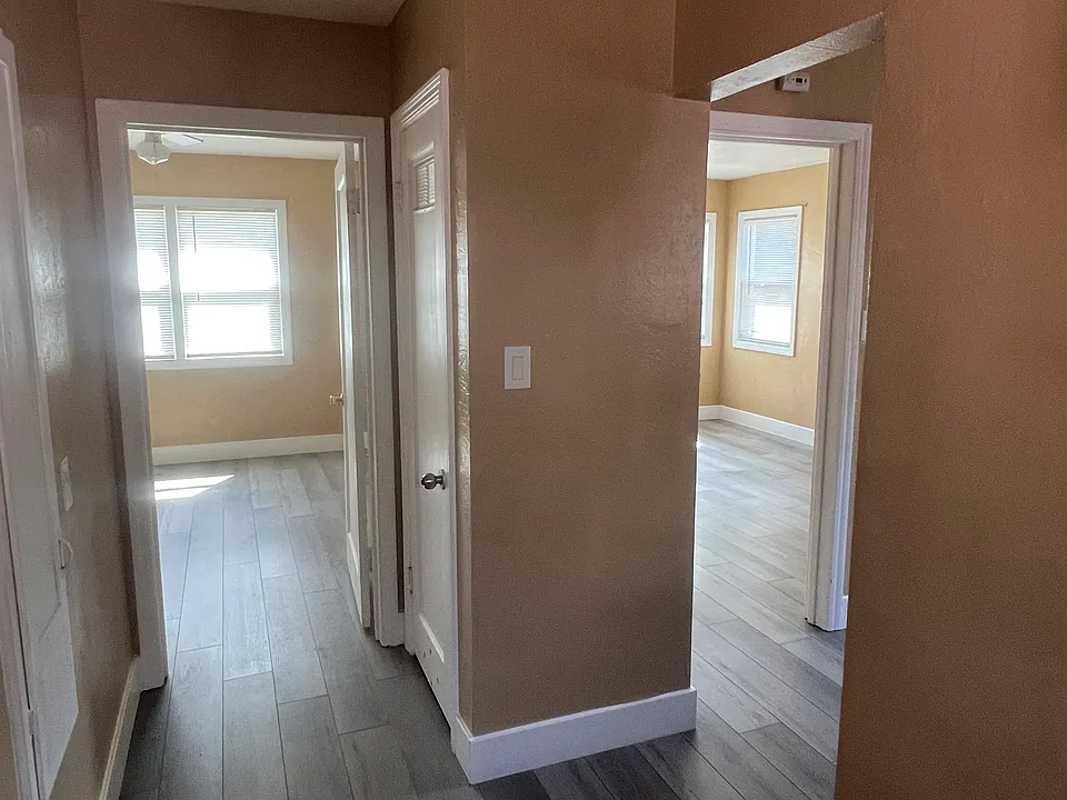 View from the Laundry area to the bedroom and Kitchen