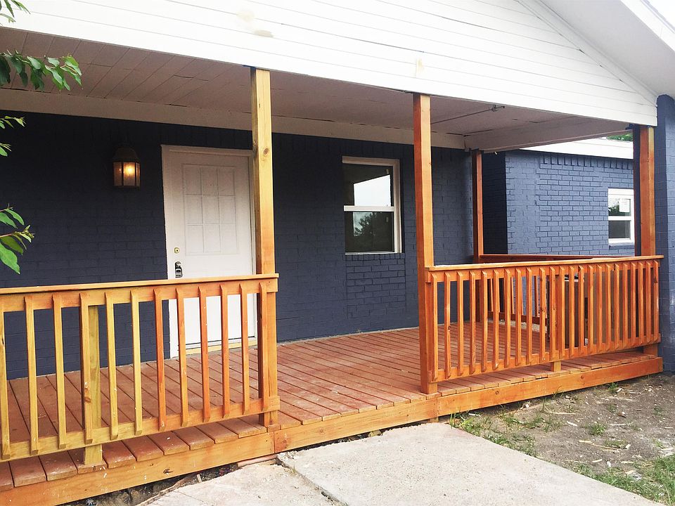 Newly painted and large deck to enjoy the kids playing on the large front yard