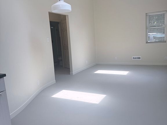 Looking at doorway from living area into hallway.