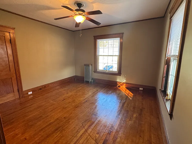 This is another photo from a different angle the spacious front bedroom.
