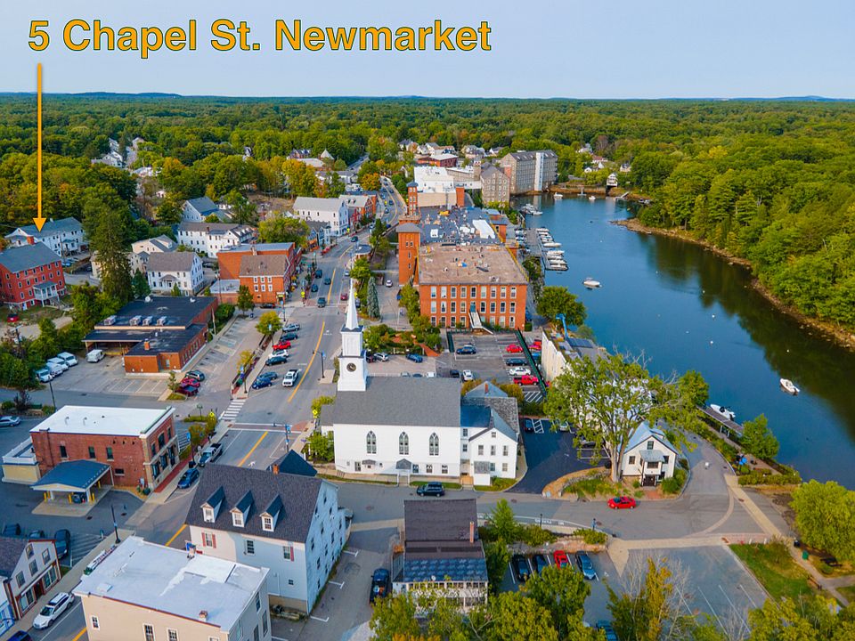 View of charming downtown Newmarket, Five Chapel on left.