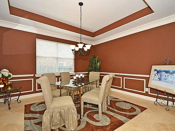Formal Dining room with travertine flooring.