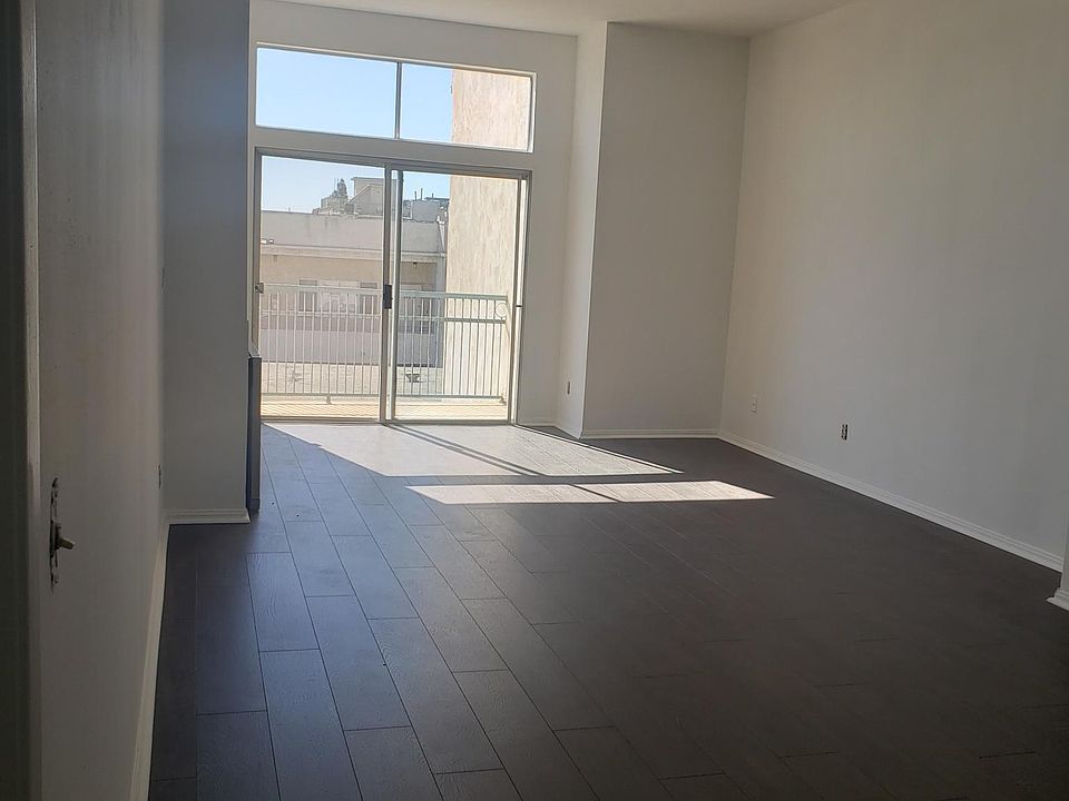 Front room of 301, new hardwood floors.