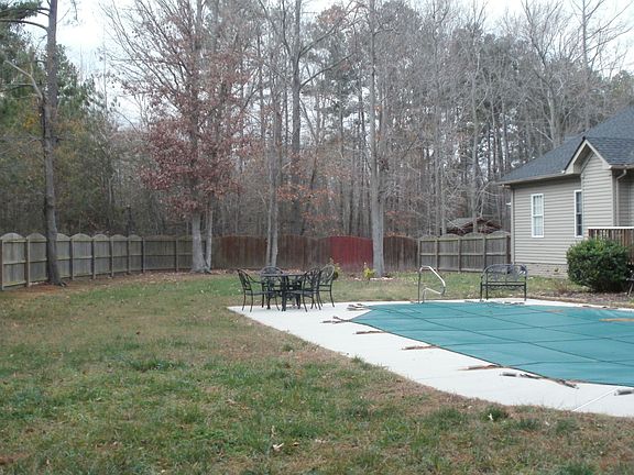 Expansive yard ready to hold all the best spring and summer events.  