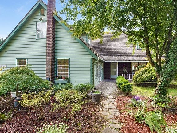 Main home features 4 bedrooms, 2.5 baths, office/den & 2 large bonus rooms or at home business office!