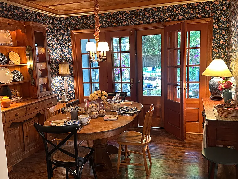 Dining room, original wallpaper, french doors to backyard