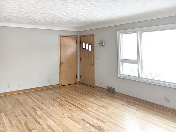 Living Room w/ Coved Ceiling