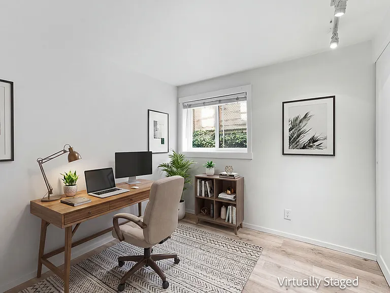 Second bedroom staged with office