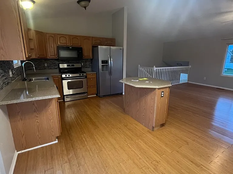 3023 W 63rd Ln — Photo 4
