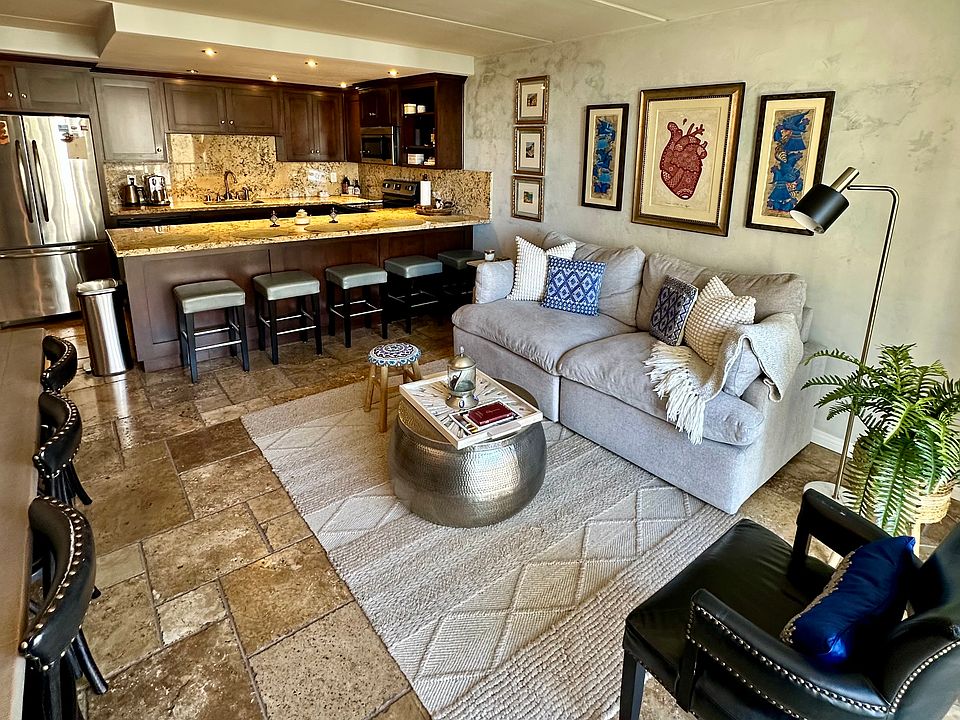 Living Room - Bright, open living space with stunning city views.