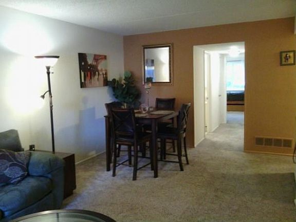 dining area and hallway plus walkin closet and linen closet