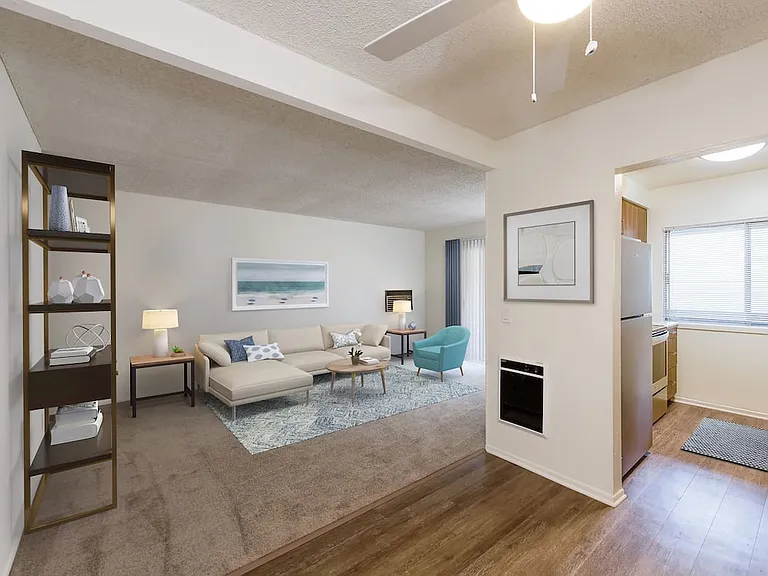 Renovated I kitchen and dining area with hard surface flooring and carpeted living area