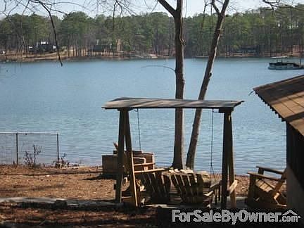 Swinging and rocking - down by the lake : Watch the sunrise from your rocker, or warm by the firepit