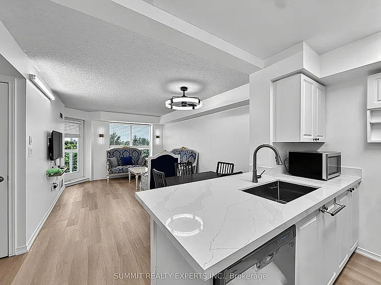 300 Ray Lawson Blvd #512 — Photo 8
