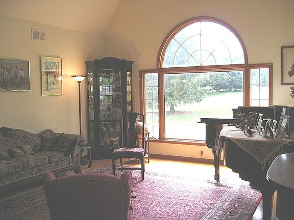 Formal Living Room Cathedral ceiling and Large window