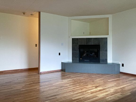 View of living room from front door area.