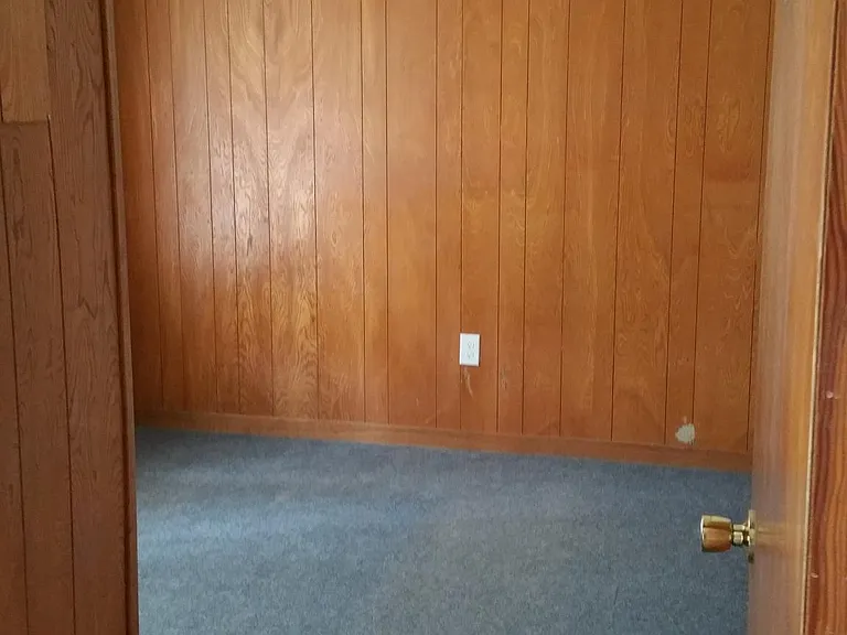Front bedroom. Could also be office.