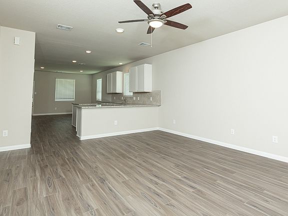 Family Room to Kitchen and Dining Area