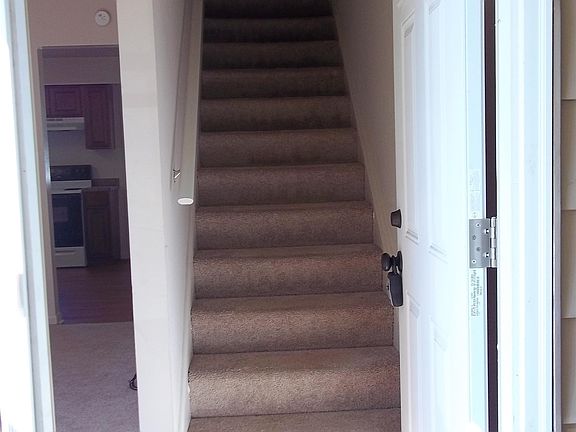 Inside Front Door -

Flight of steps to the 2 bedrooms & 1 bathroom upstairs