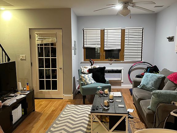 Living room and door to balcony (bottom floor)
