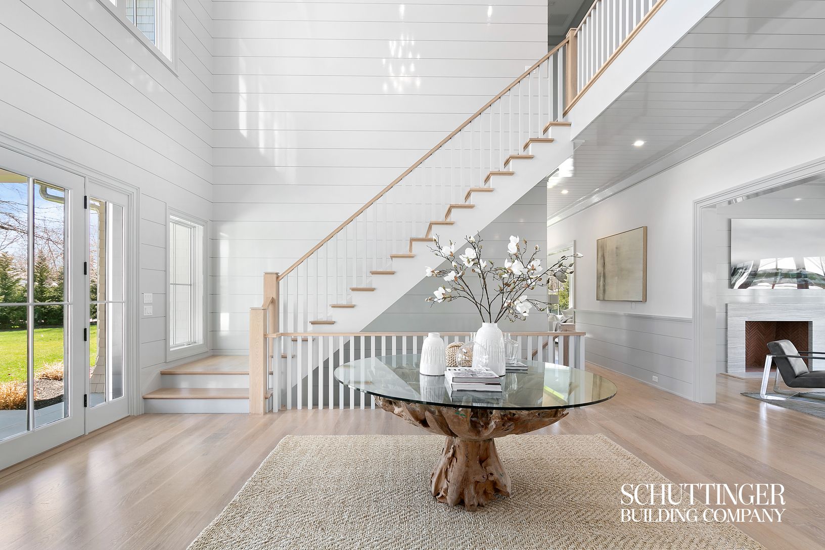  Grand Double Height Foyer with High Gloss Shiplap Paneling Floor to Ceiling