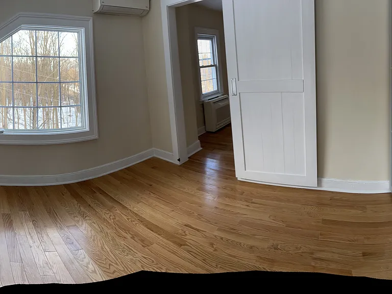 Panorama photo of bedroom.