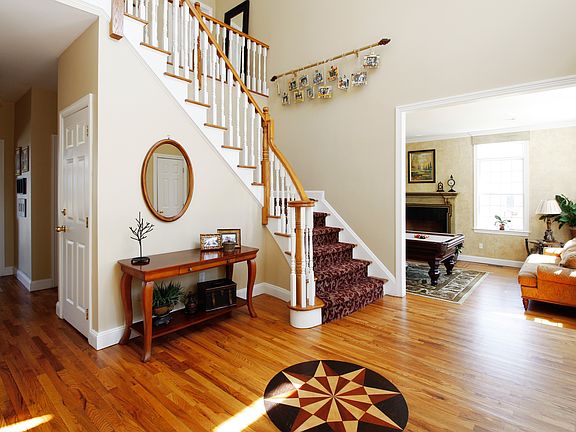 2-Story Entry Foyer with Inlaid Wood Medallion