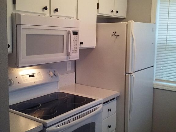 Easy-clean glass cook-top. Built in micro. Good-size fridge.